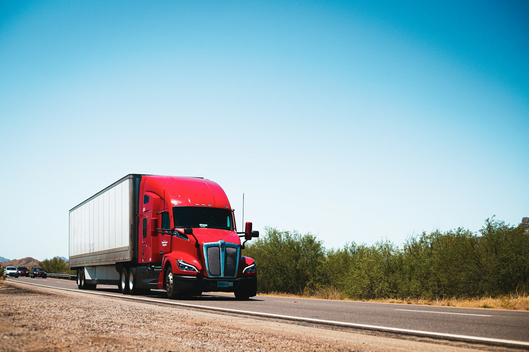 Semi truck pulling a 53-foot dry van trailer on an open highway